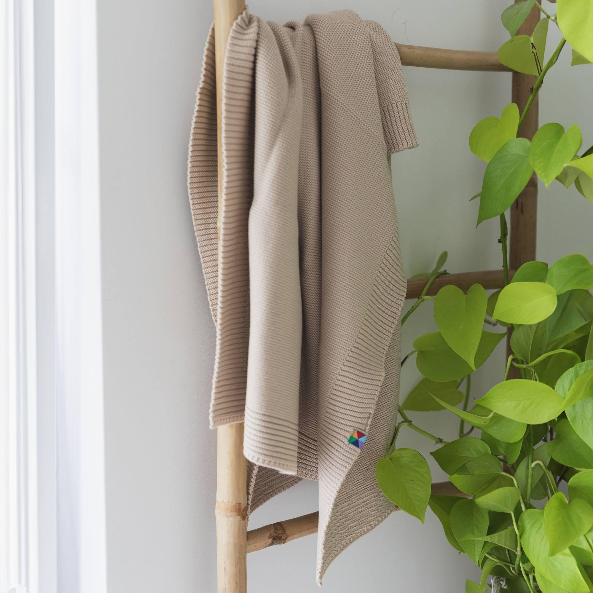 Beige merino wool knitted blanket