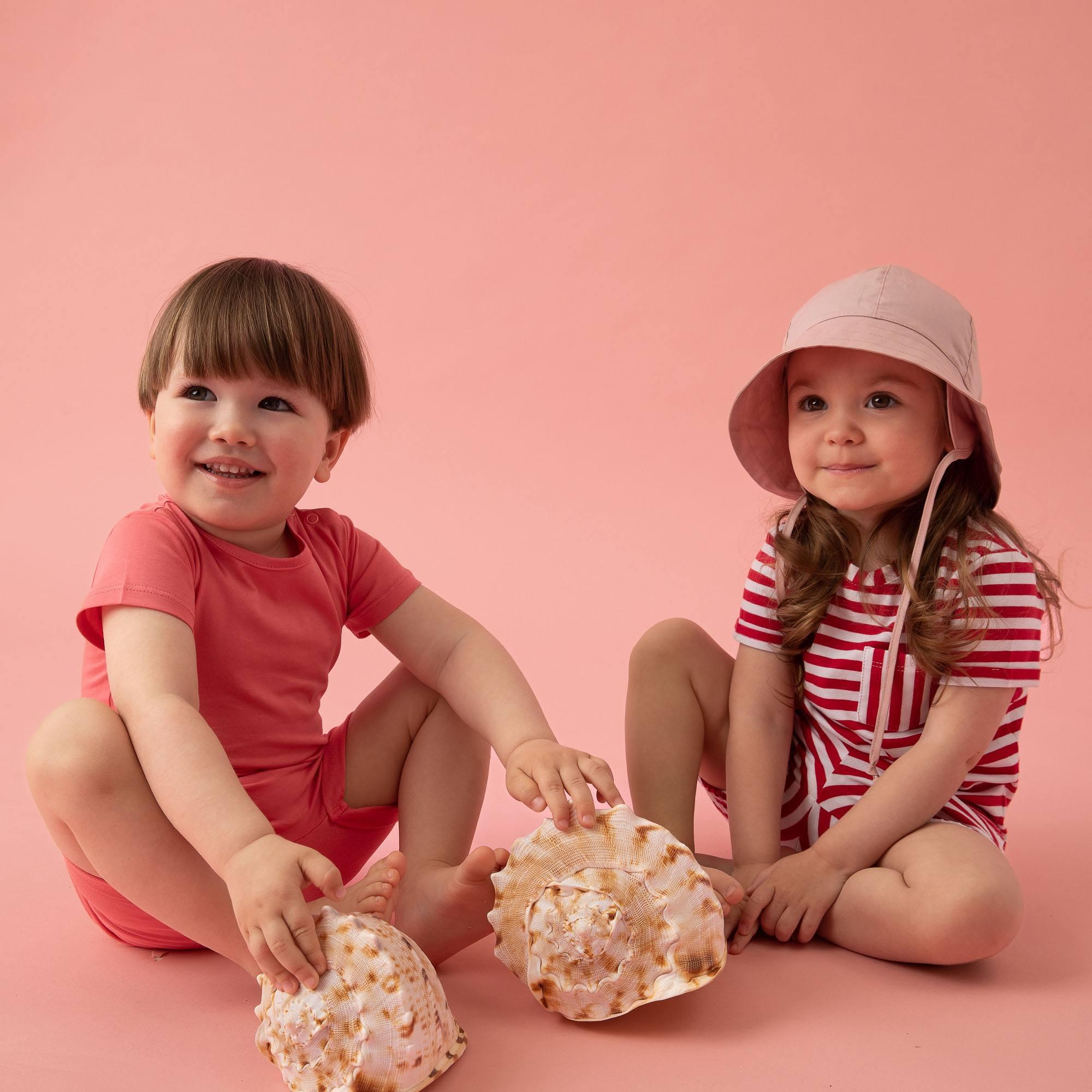 Pastel pink hat with drawstrings