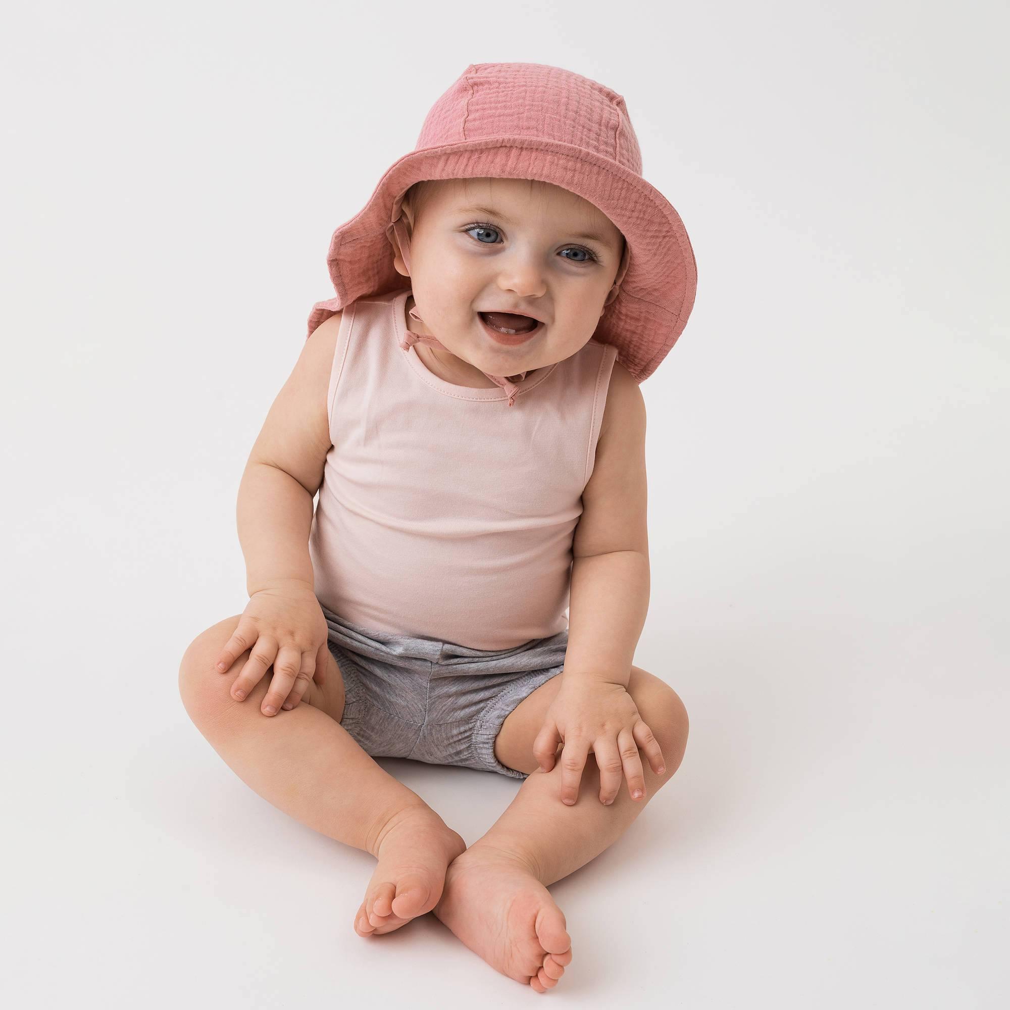 Pink muslin hat with strings Baby