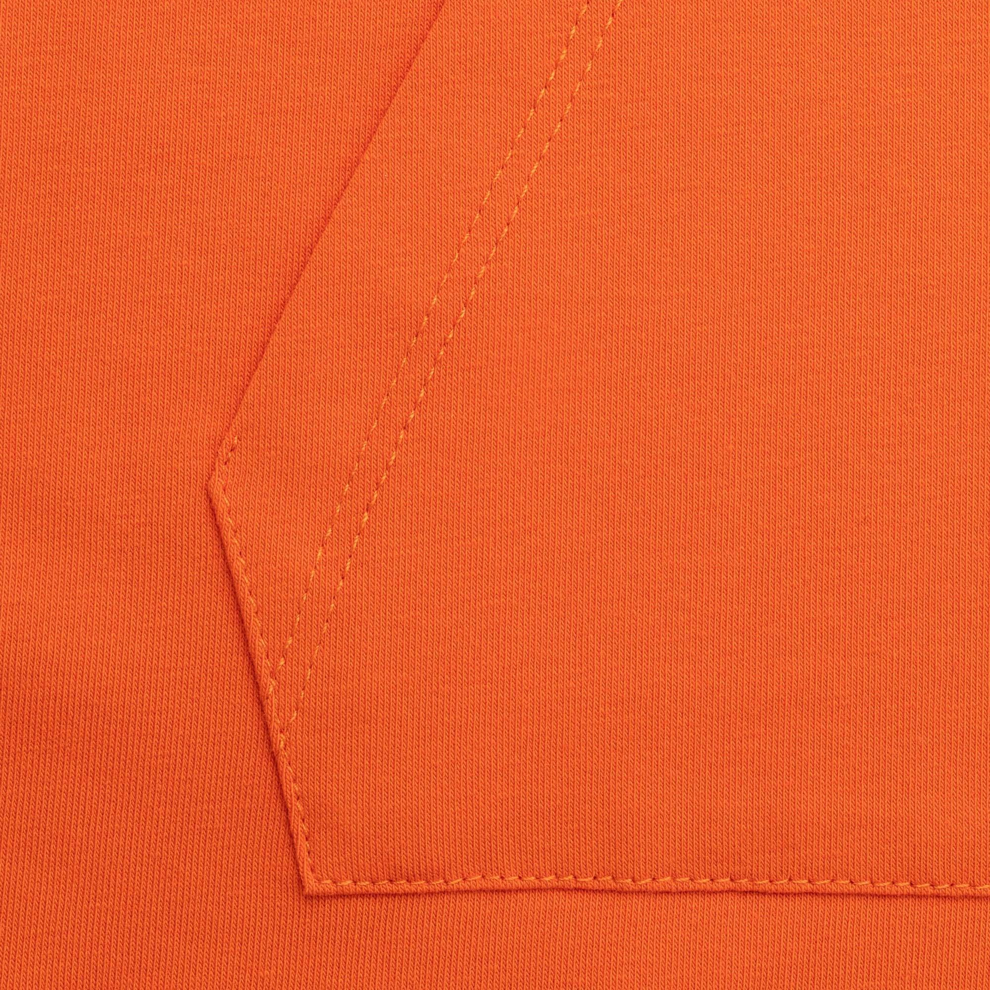 Orange front pocket blouse