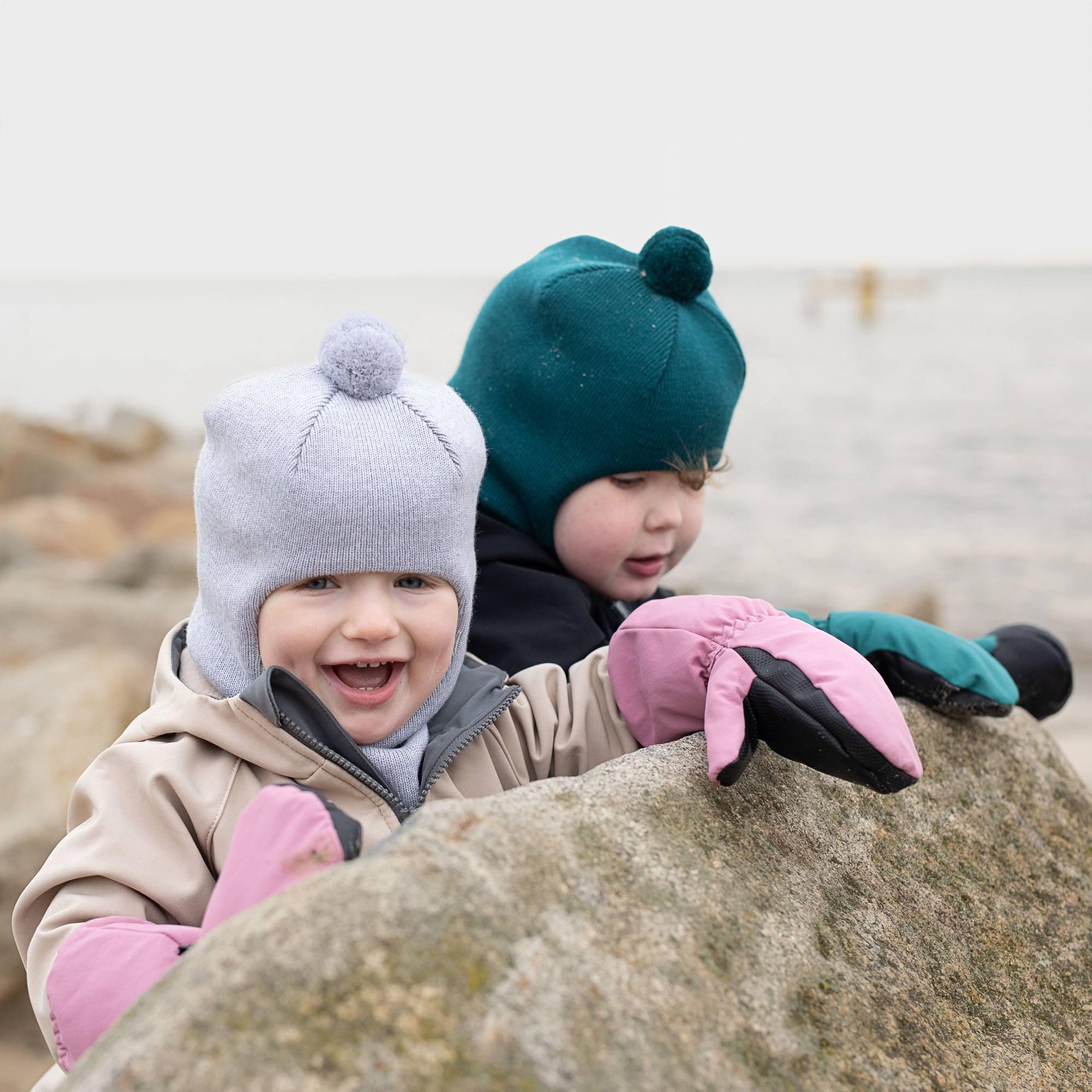 Pastel pink winter mittens kids