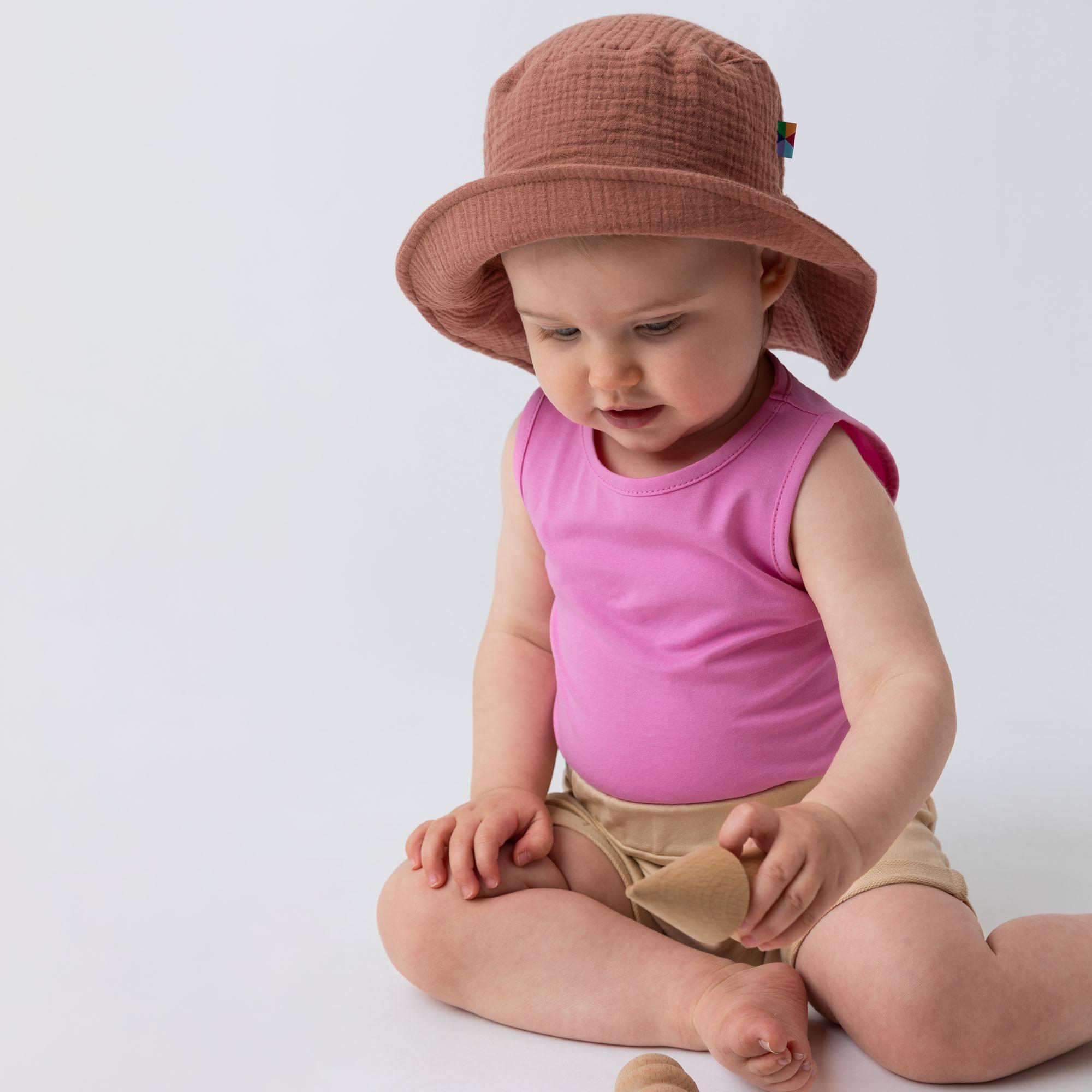 Pastel pink sleveless bodysuit