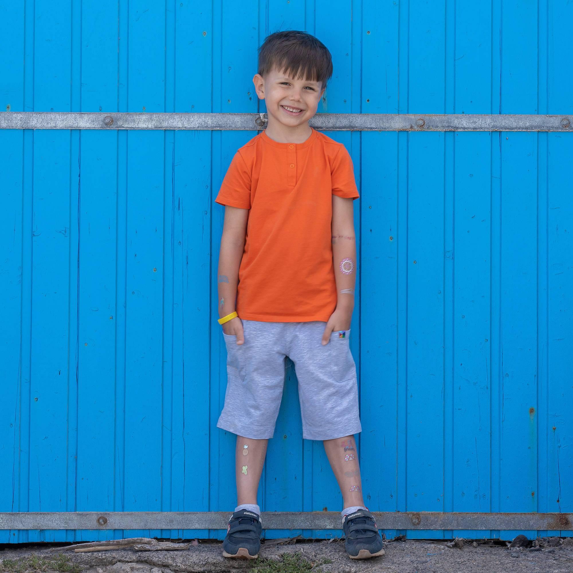 Orange round neck button-up shirt