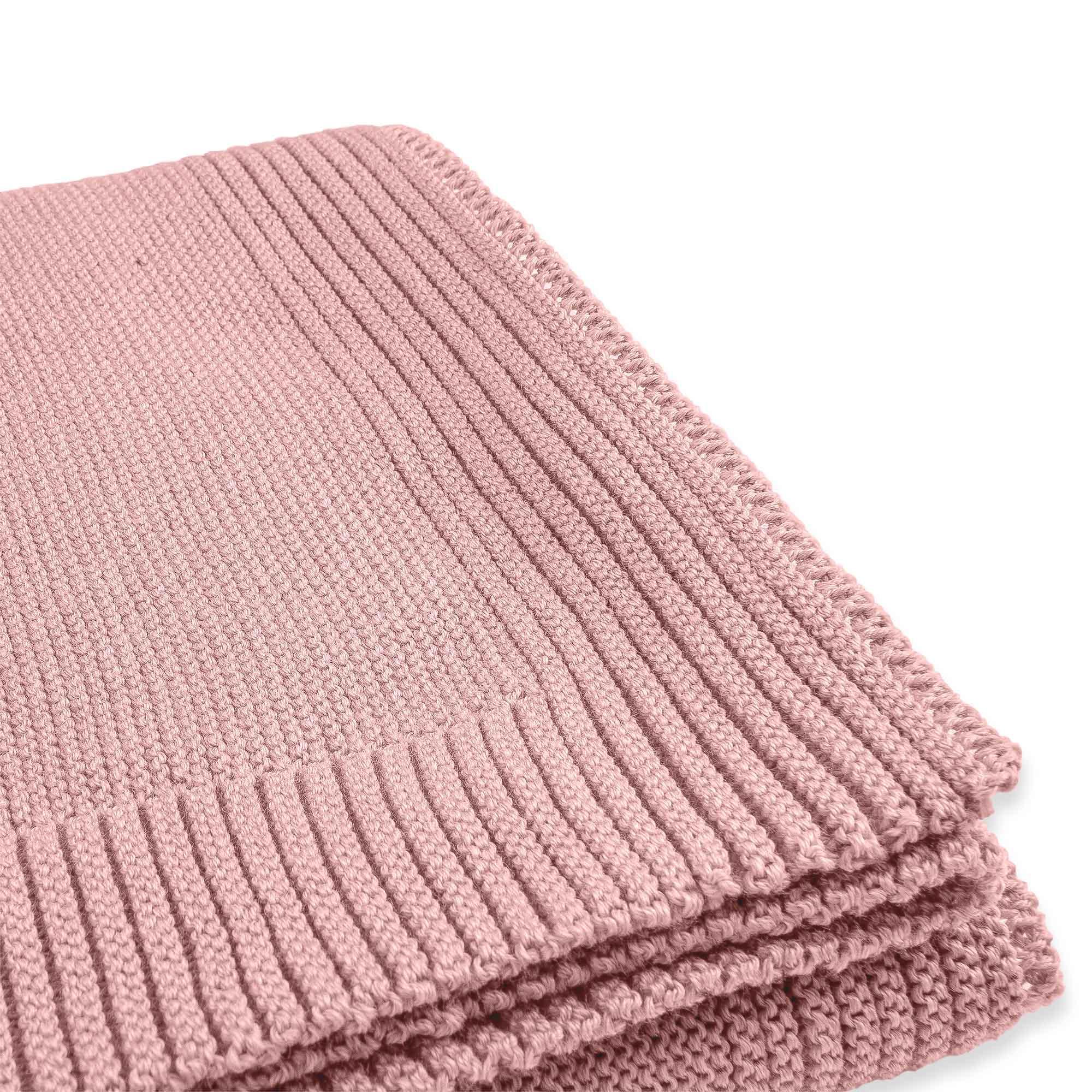 Pastel pink merino wool knitted blanket