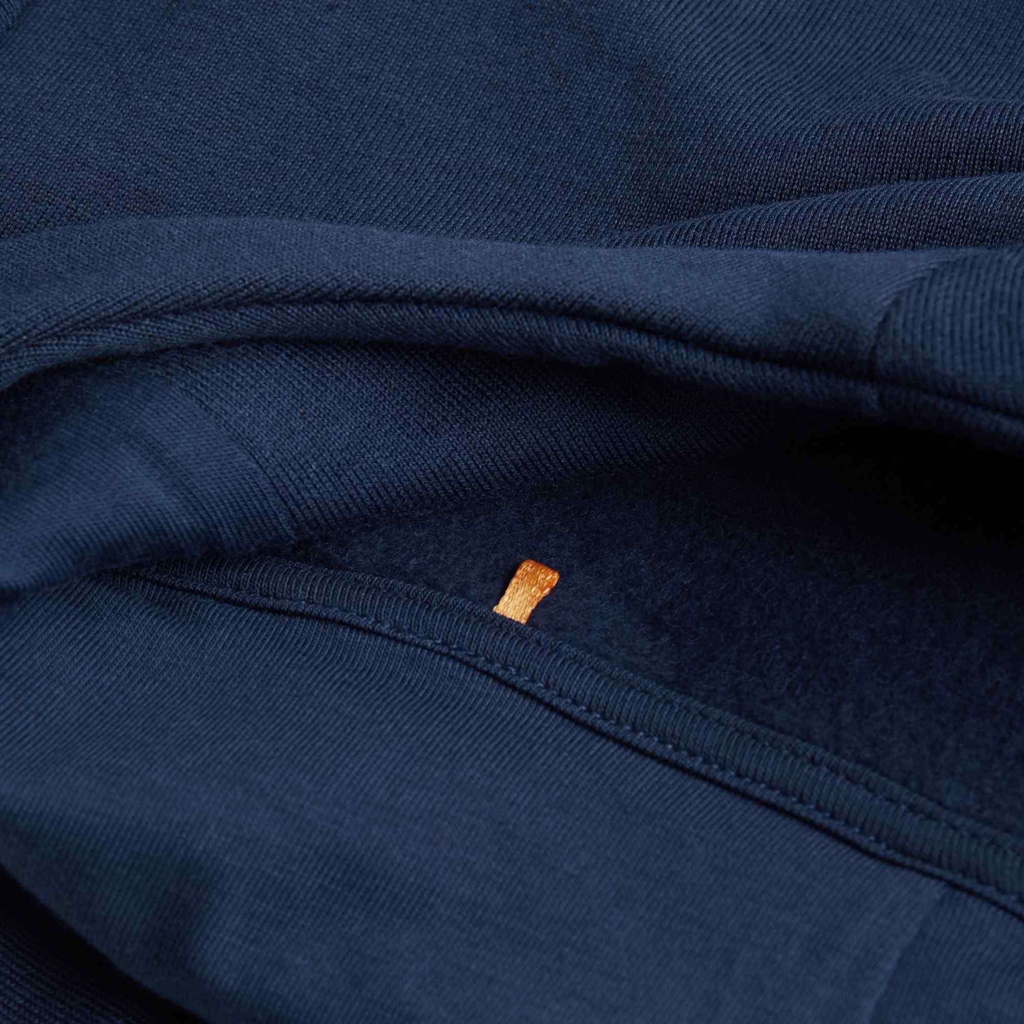 Navy blue fleece-lined pullover hoodie