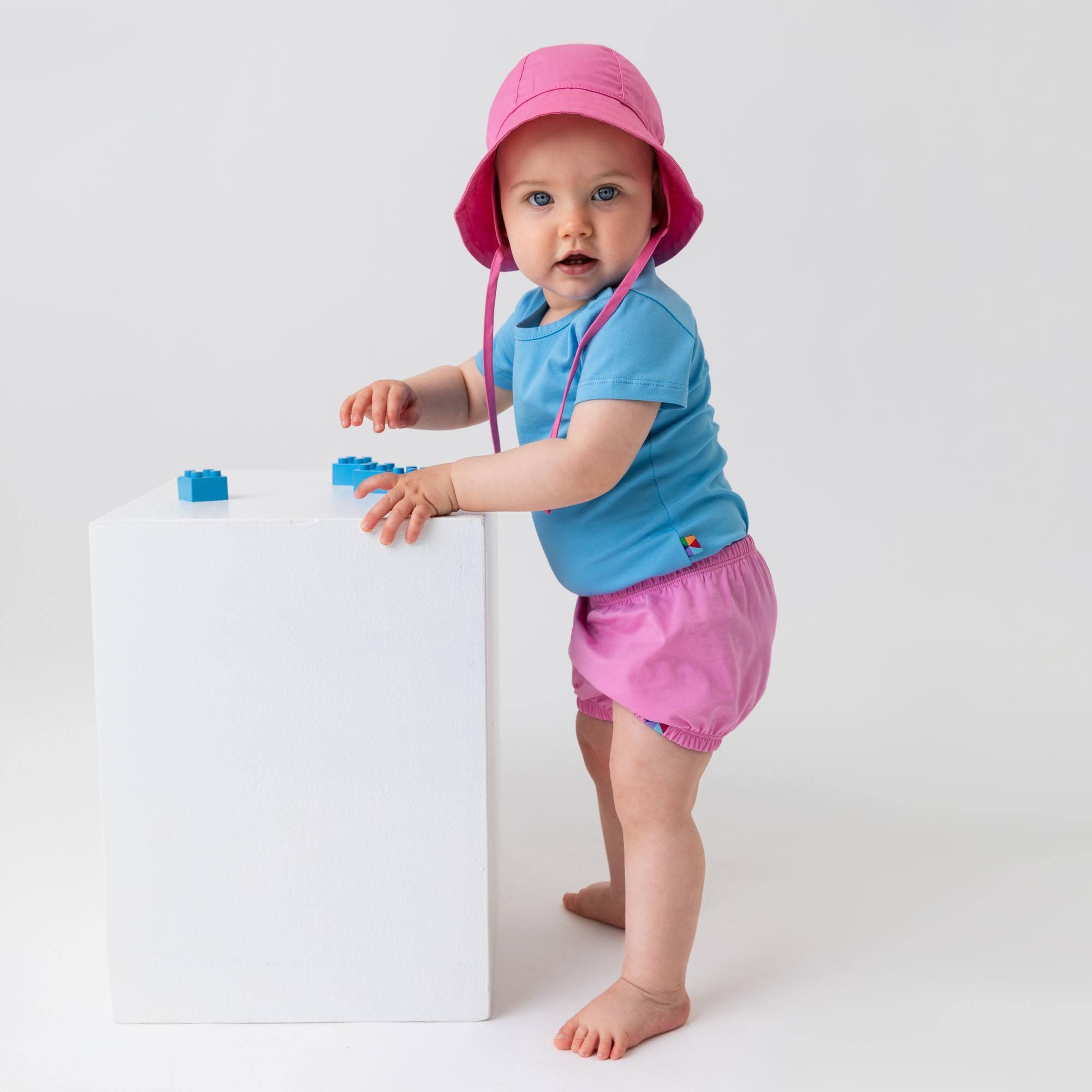 Pastel pink hat with drawstrings