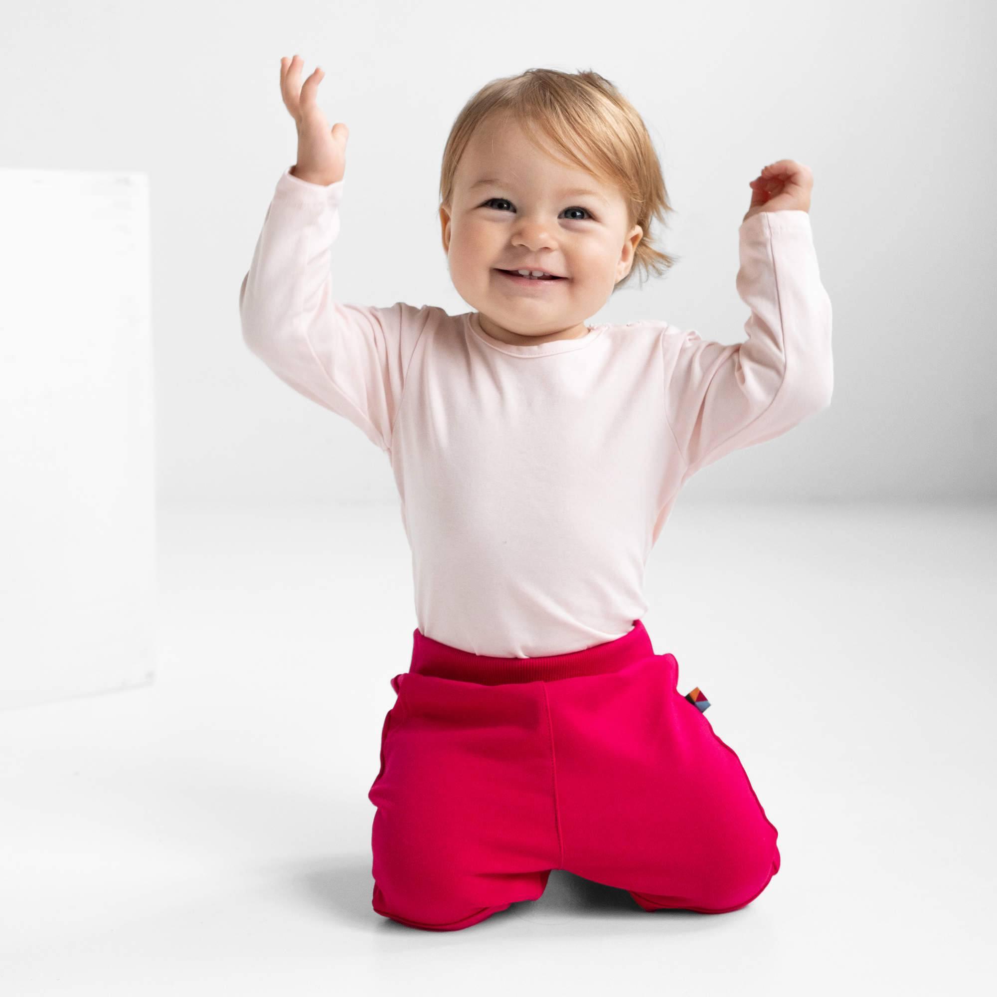 Light pink long sleeve bodysuit