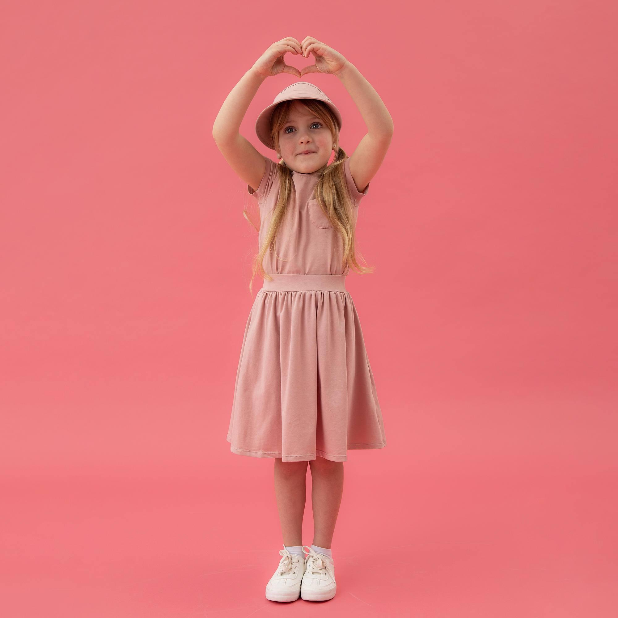 Pastel pink midi skirt with pockets