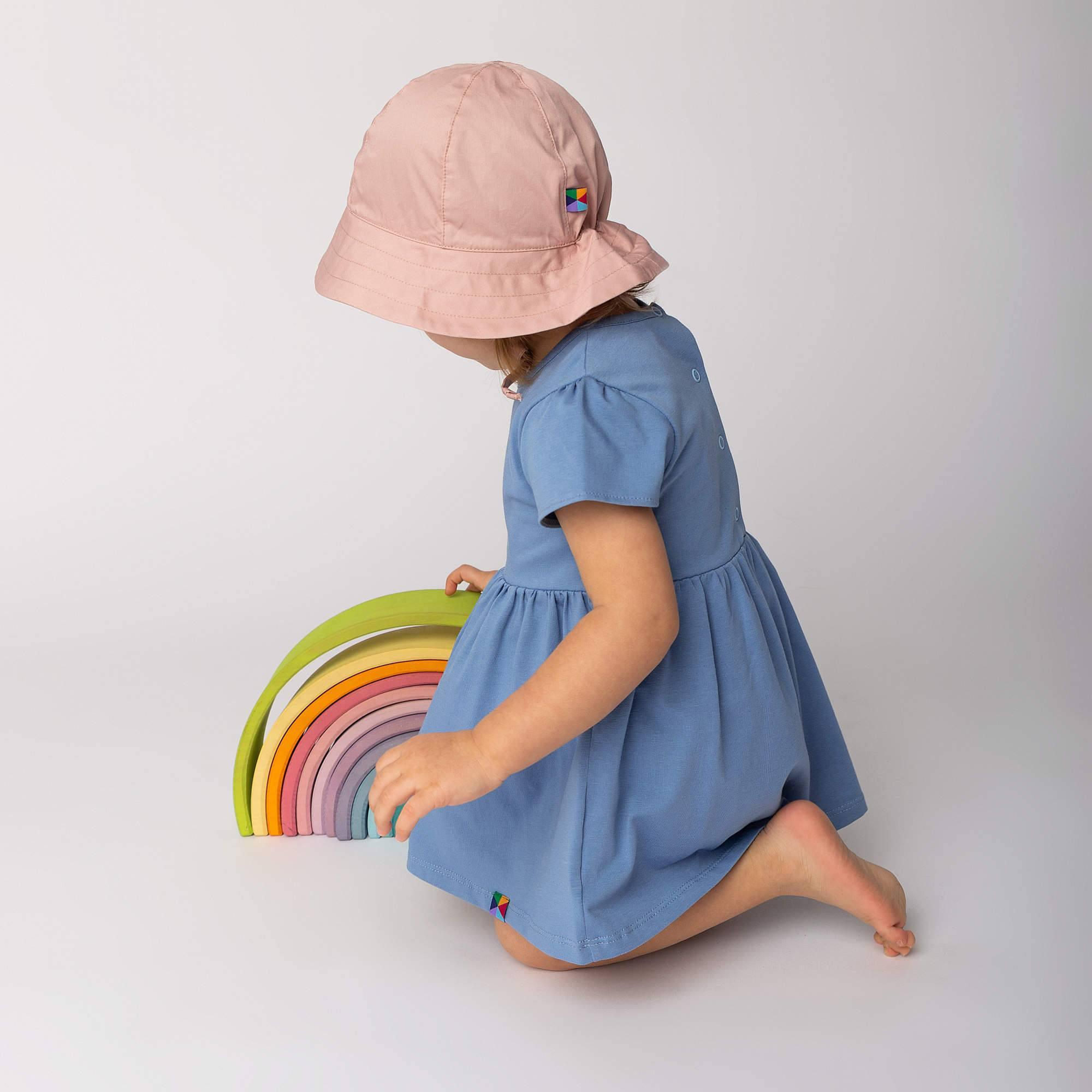 Pastel pink hat with drawstrings