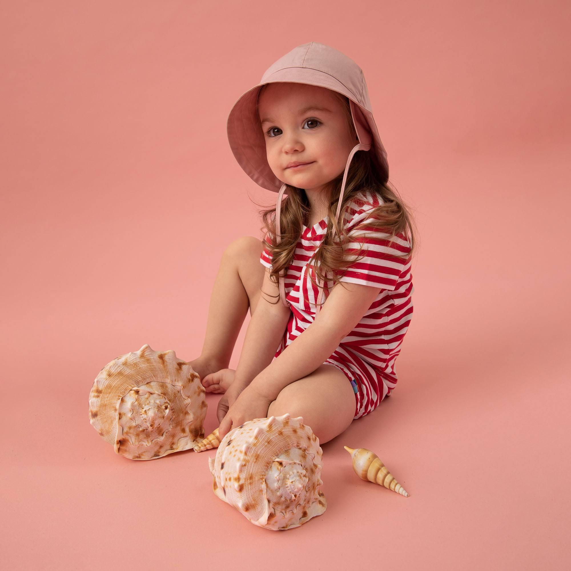 Pastel pink hat with drawstrings