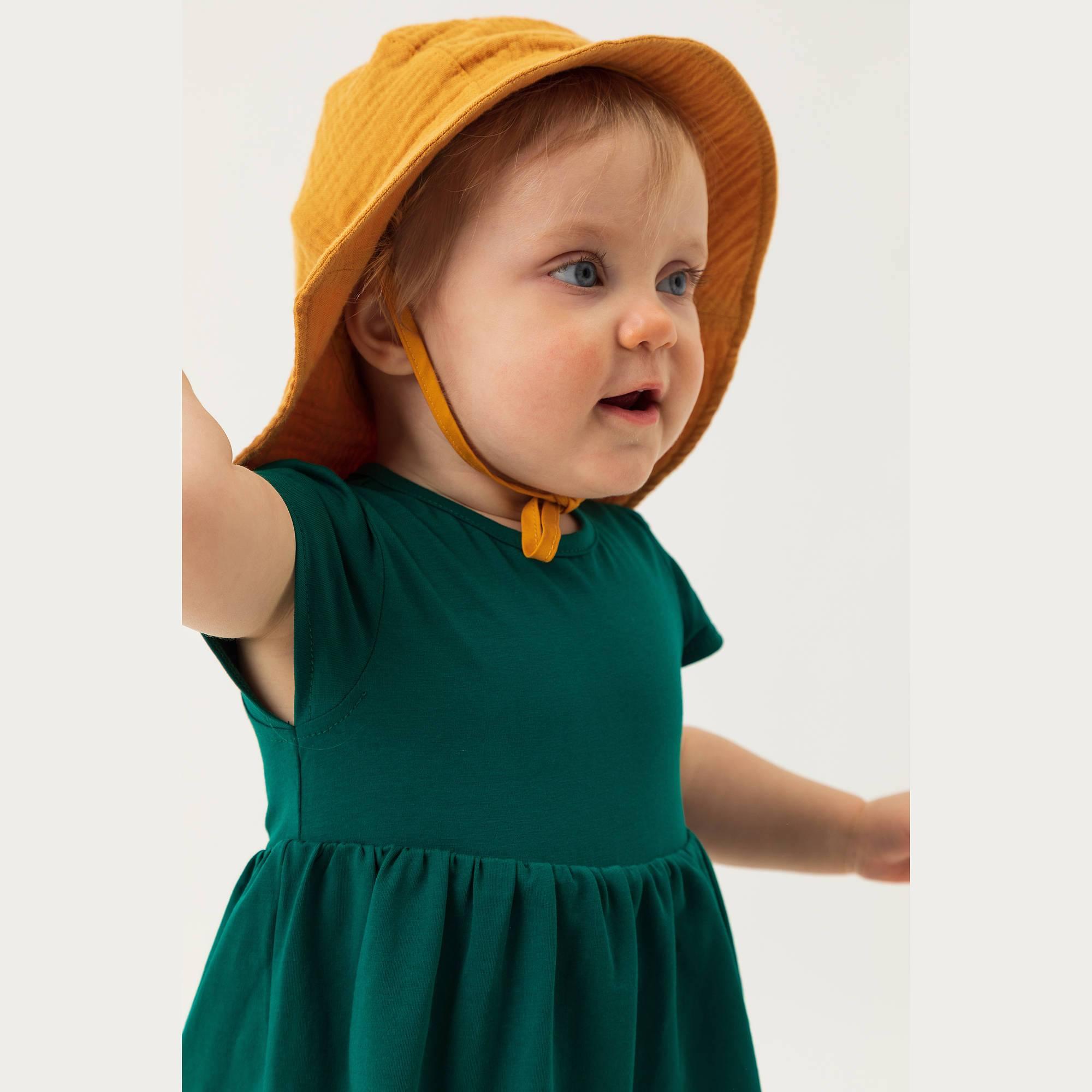 Mustard muslin hat with strings Baby