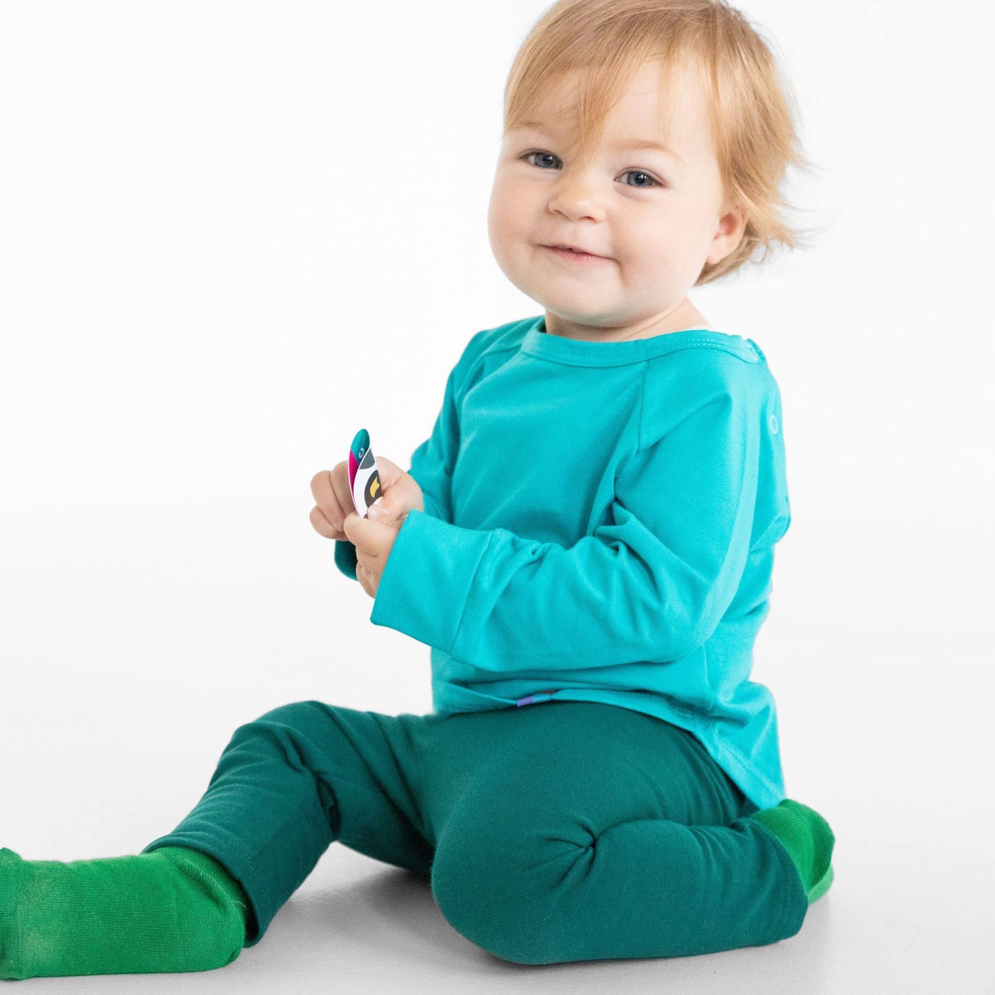 Bottle-green fleece-lined leggings Baby