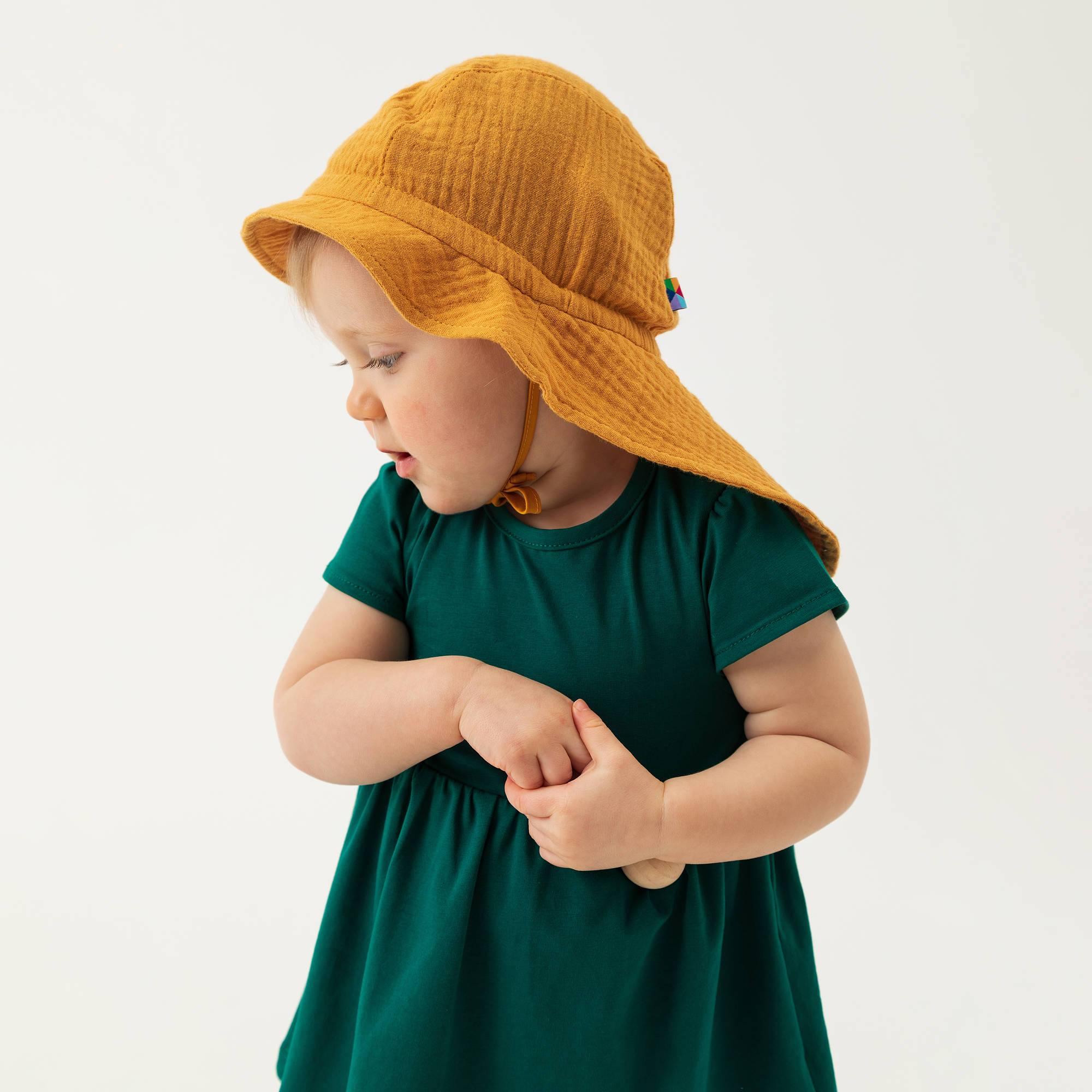 Mustard muslin hat with strings Baby