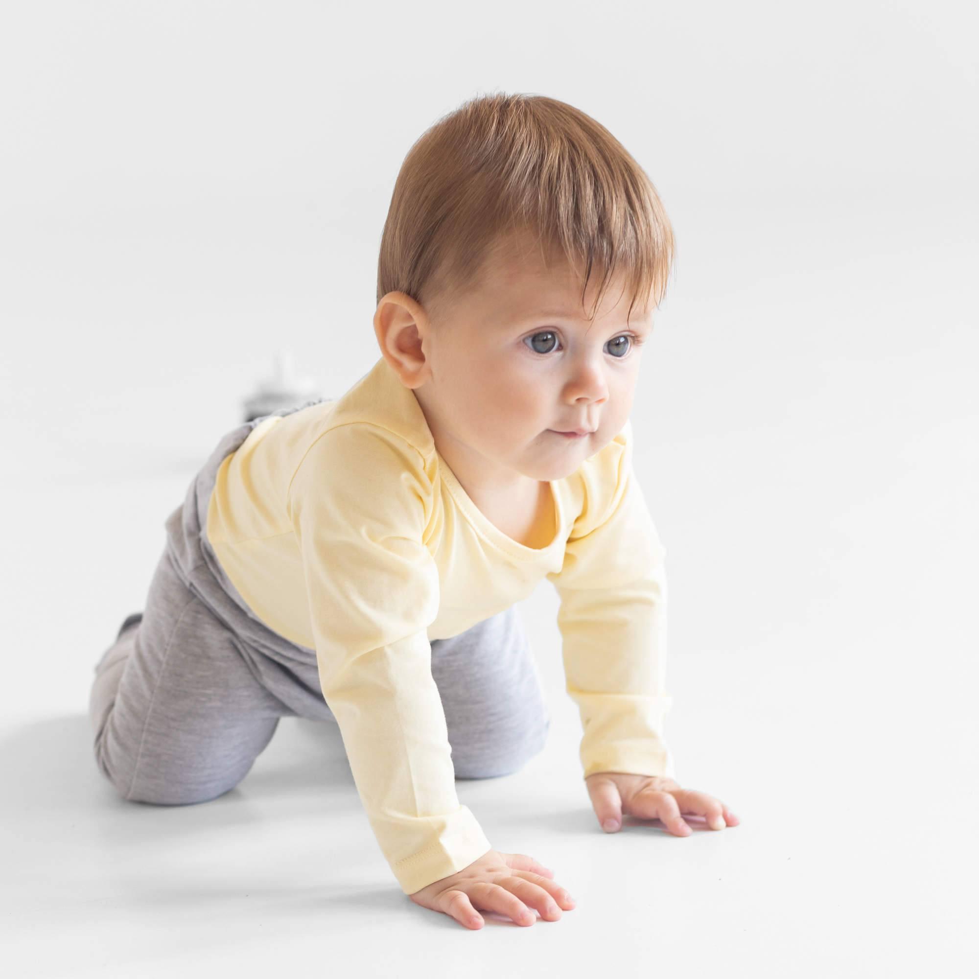 Light yellow long sleeve bodysuit