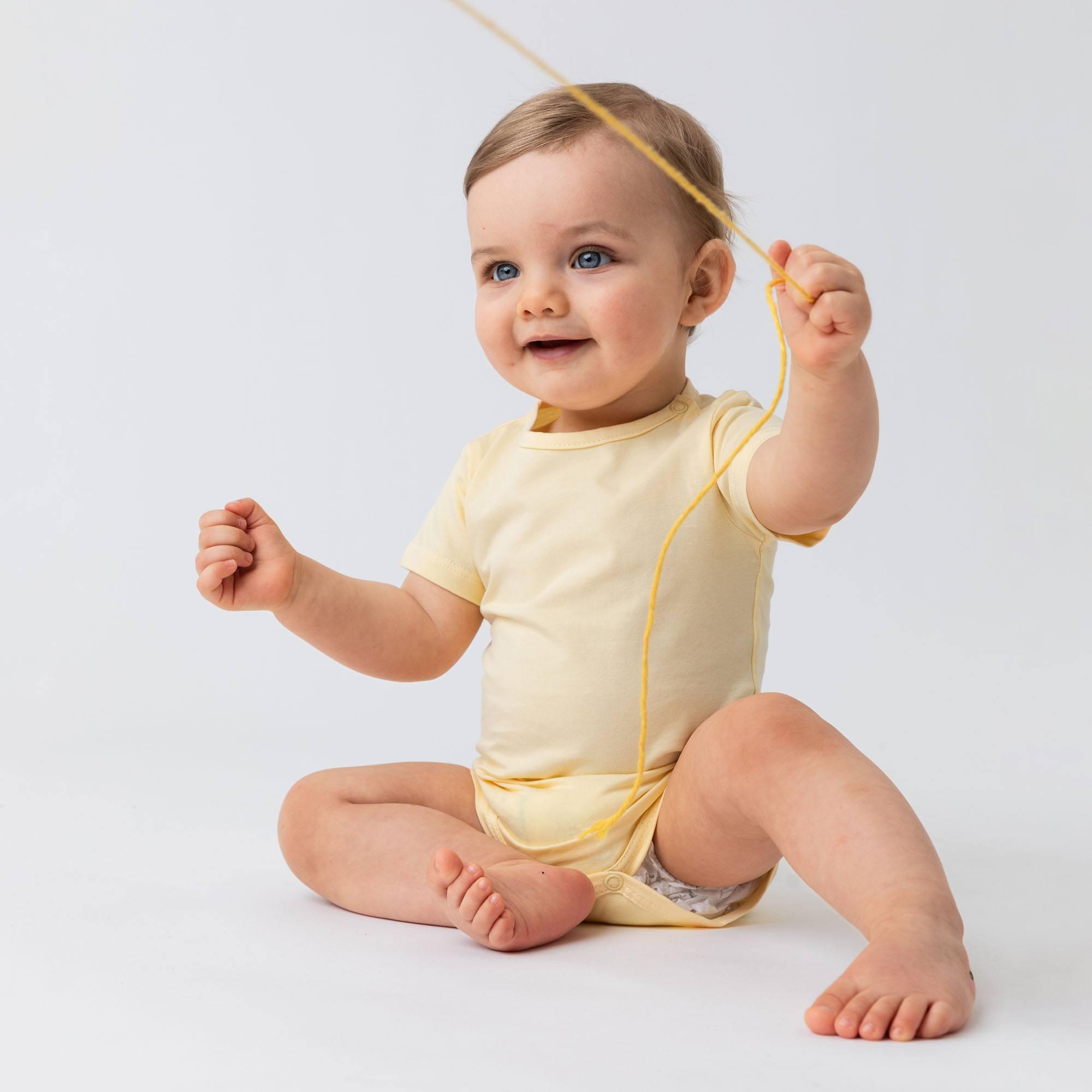 Light yellow short sleeve bodysuit