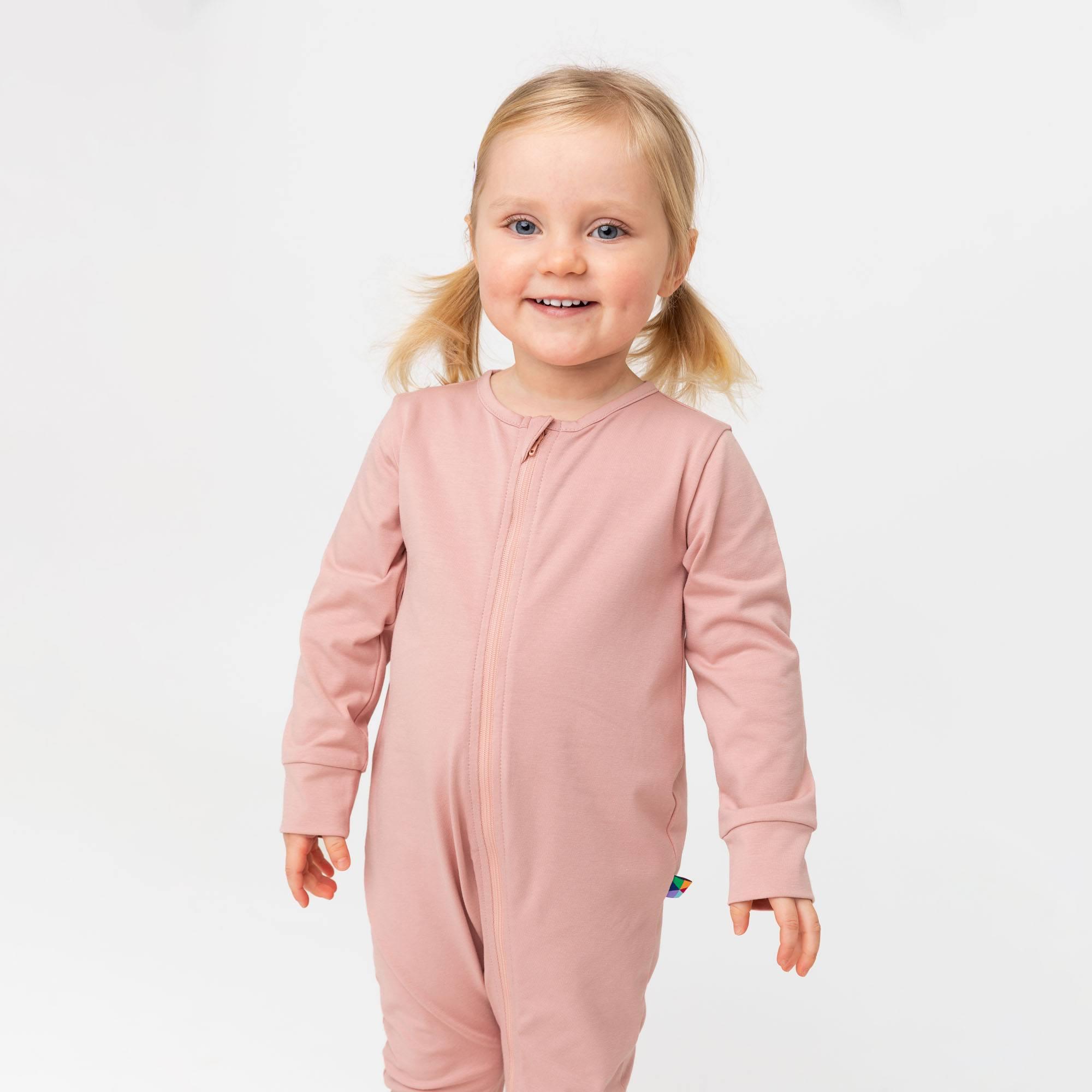 Pastel pink romper suit