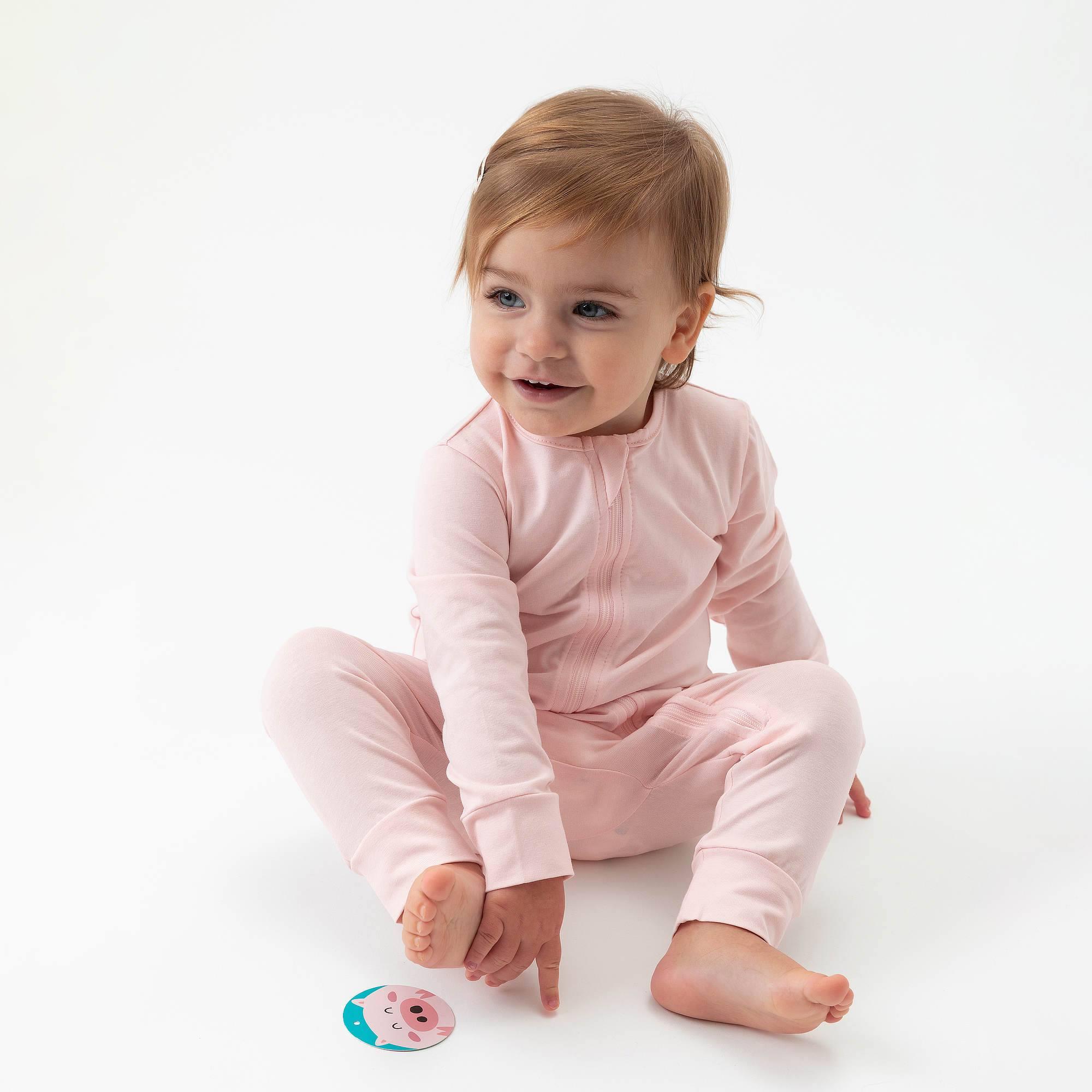 Light pink romper suit