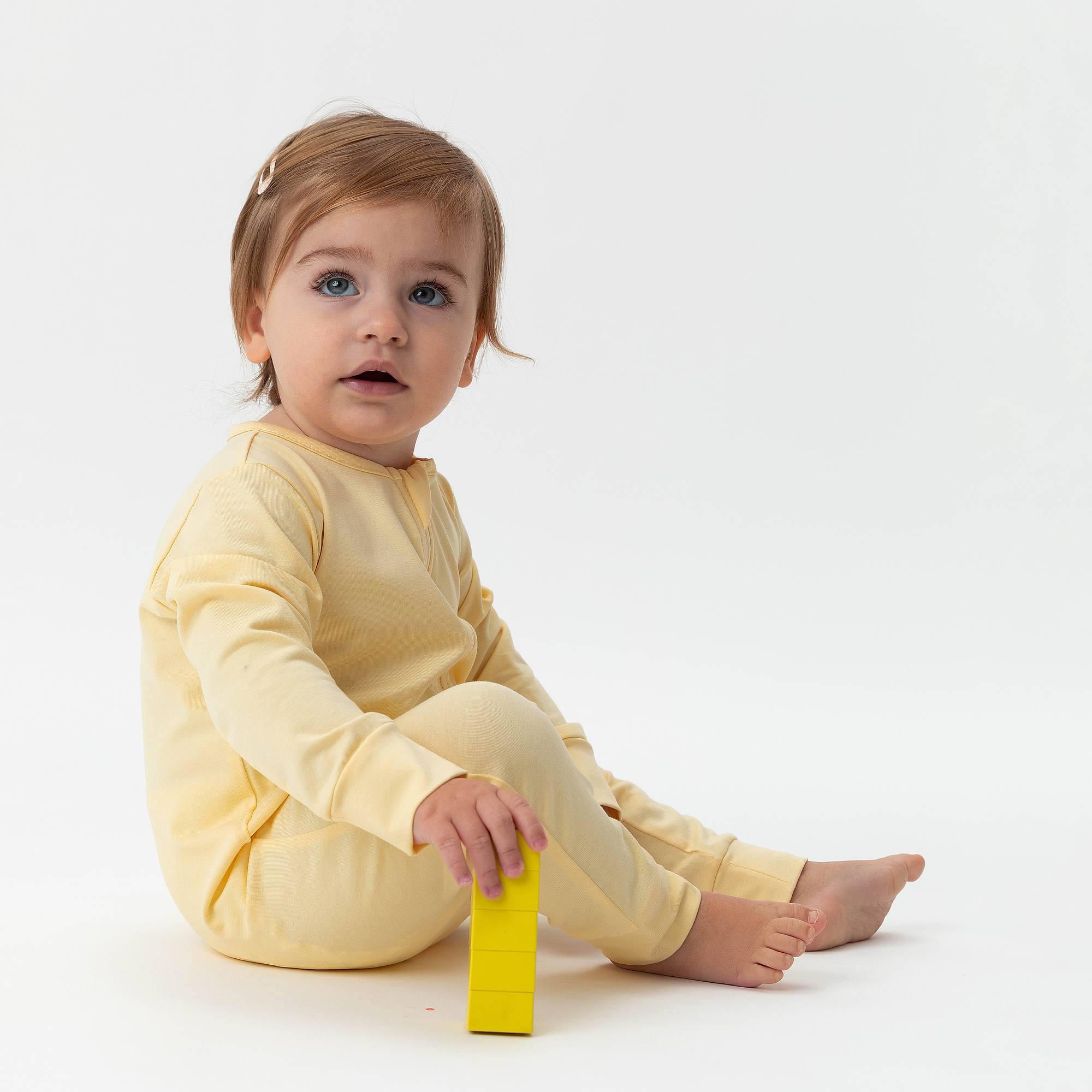 Light yellow romper suit