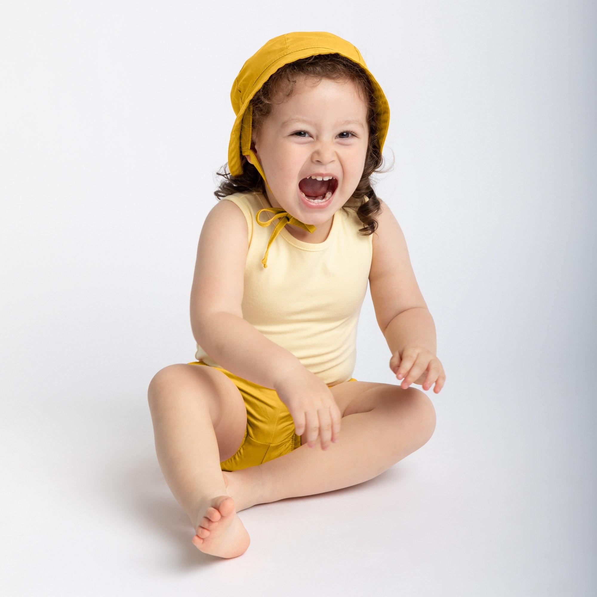 Mustard hat with drawstrings